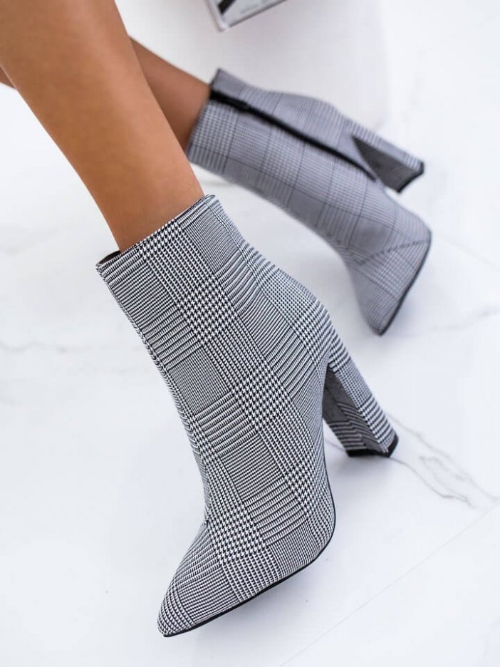 Black and white patterned ankle boots