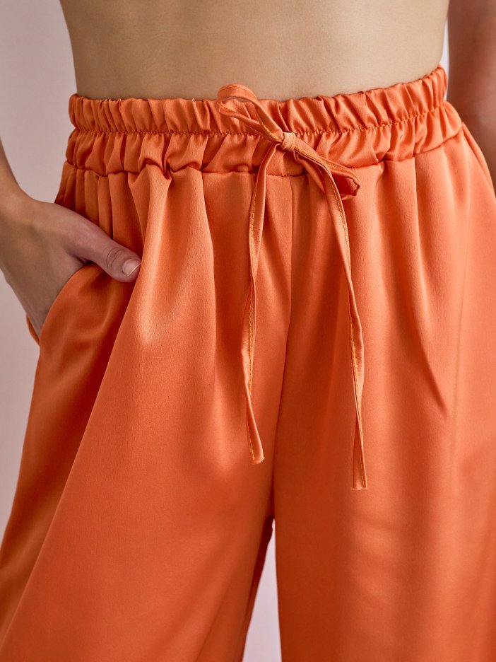 Oranžové saténové nohavice Paula