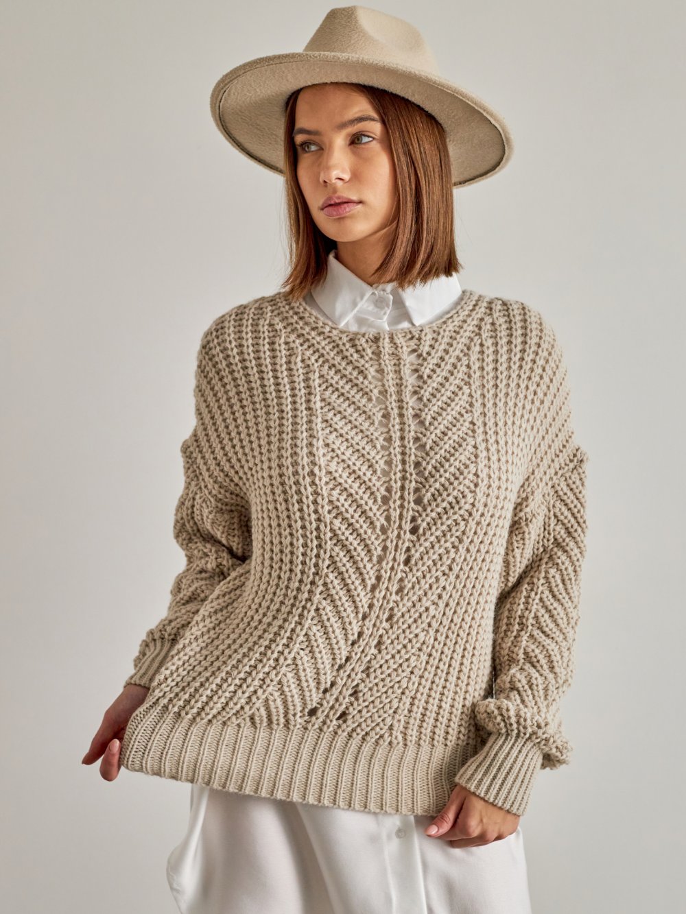 Béžový pletený sveter Dior